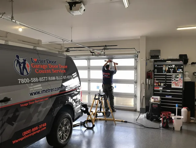Plainville Garage Door Repair team performing same-day garage door repair in Plainville