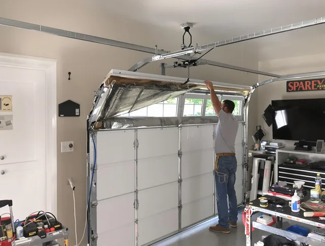 Garage door section replacement by Plainville Garage Door Repair in Plainville