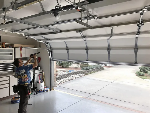 Garage door track repair service by Plainville Garage Door Repair in Plainville